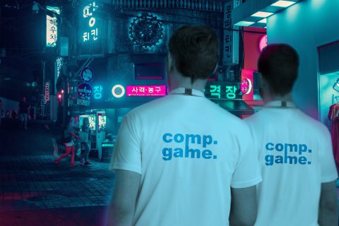 Men in T-shirts with the inscription Volunteers at a sporting pu